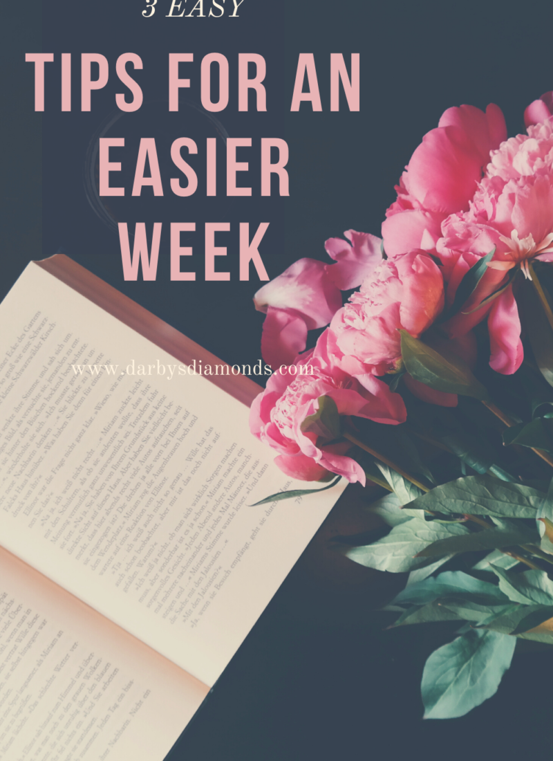 an open book with flowers next to it; tips for an easier week