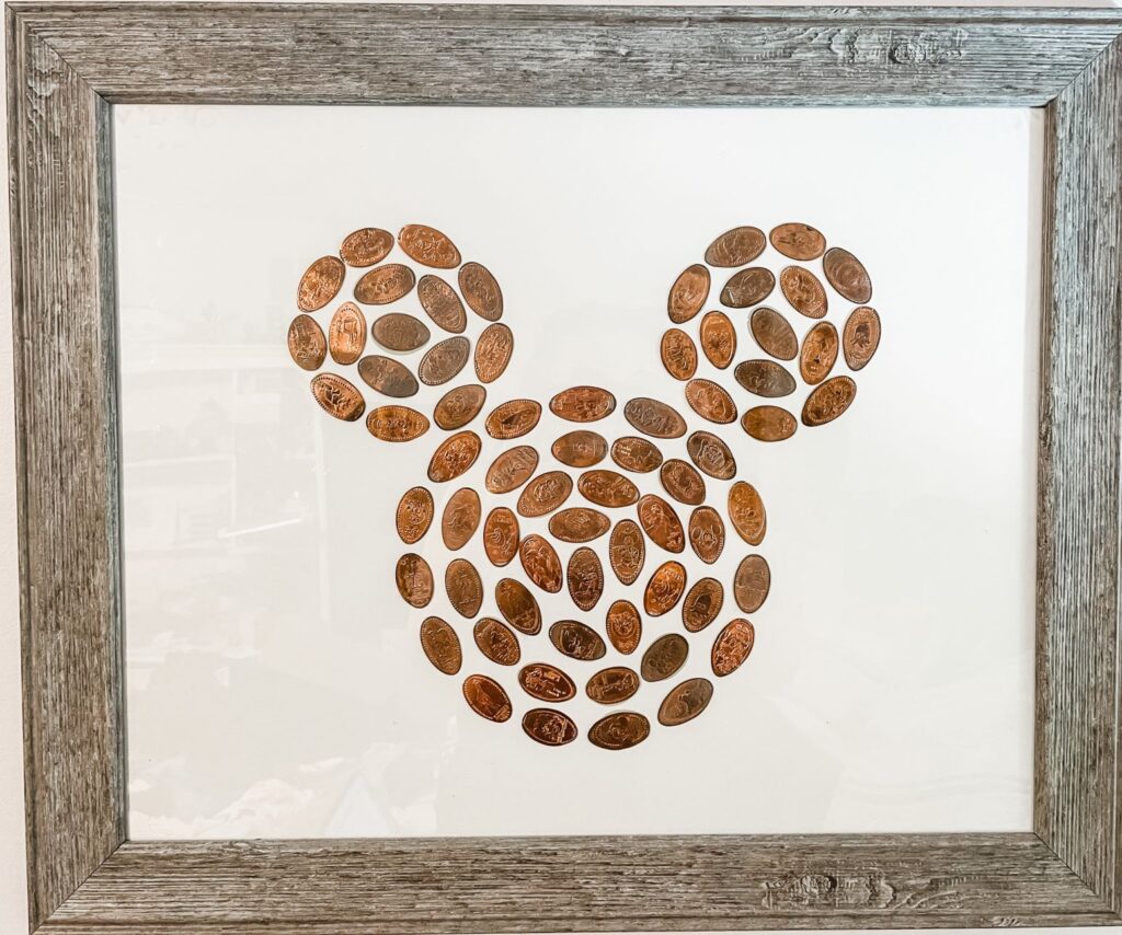 Pressed pennies make the shape of a Mickey head